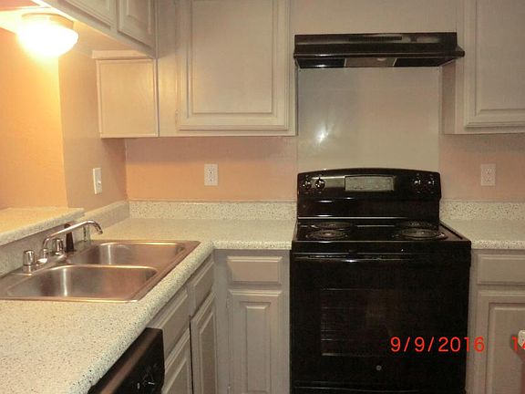 Spacious kitchen loaded with cabinets