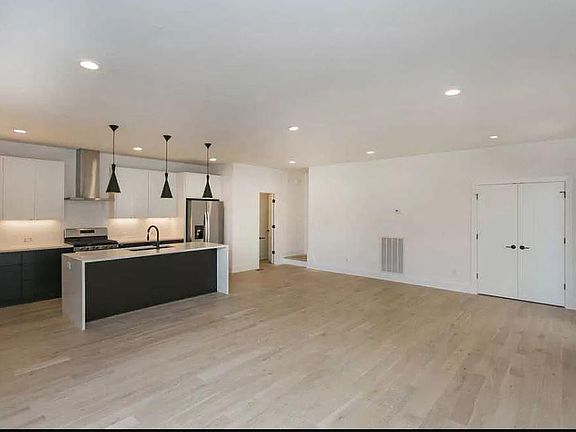 Main Living Space First Floor with Half Bathroom and Large Closet Space