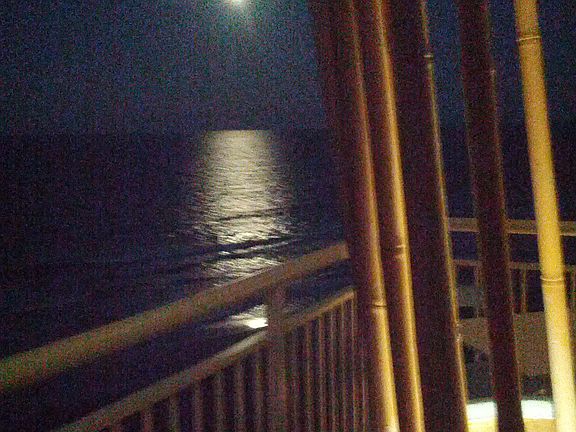 full moon over ocean