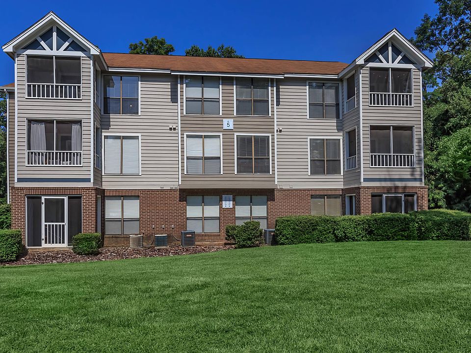 Well-Maintained Building Exterior with Spacious Lawn Area
