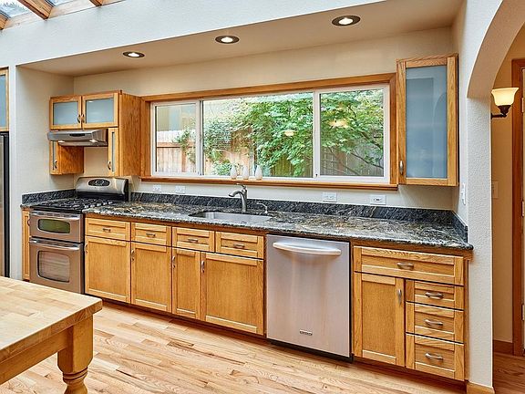 Incredible view while prepping food and doing dishes. Hand made cabinets with pull outs