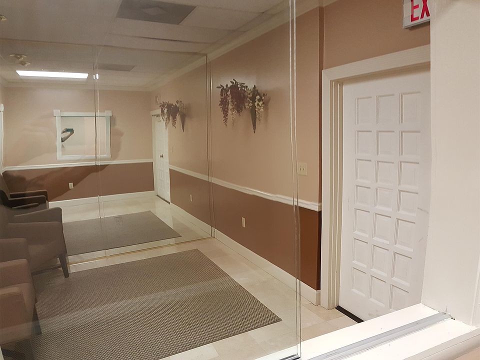 Sliding window from reception room into welcome room
