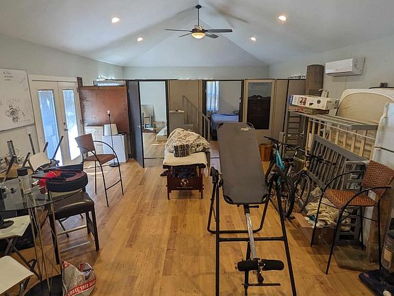 Space with bedroom partitions. Furniture will be added or removed to meet tenants needs,