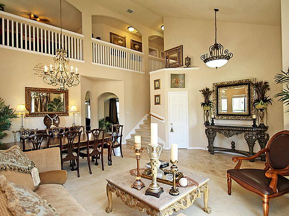 THIS SPACIOUS FLOOR PLAN IS WELL LAYED OUT-HIGH CEILINGS GIVE AN OPEN FEELING TO THE HOME