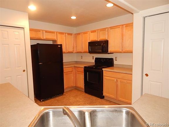 3rd image of 18905 E 57th Ave Unit C