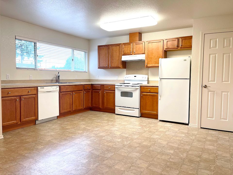 Big kitchen with loads of counter space, dishwasher and pantry.