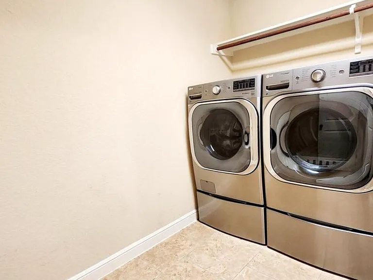 Utility room is quite large with LG Washer and Dyer included with the rent.