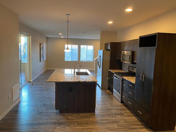 View of kitchen from front door