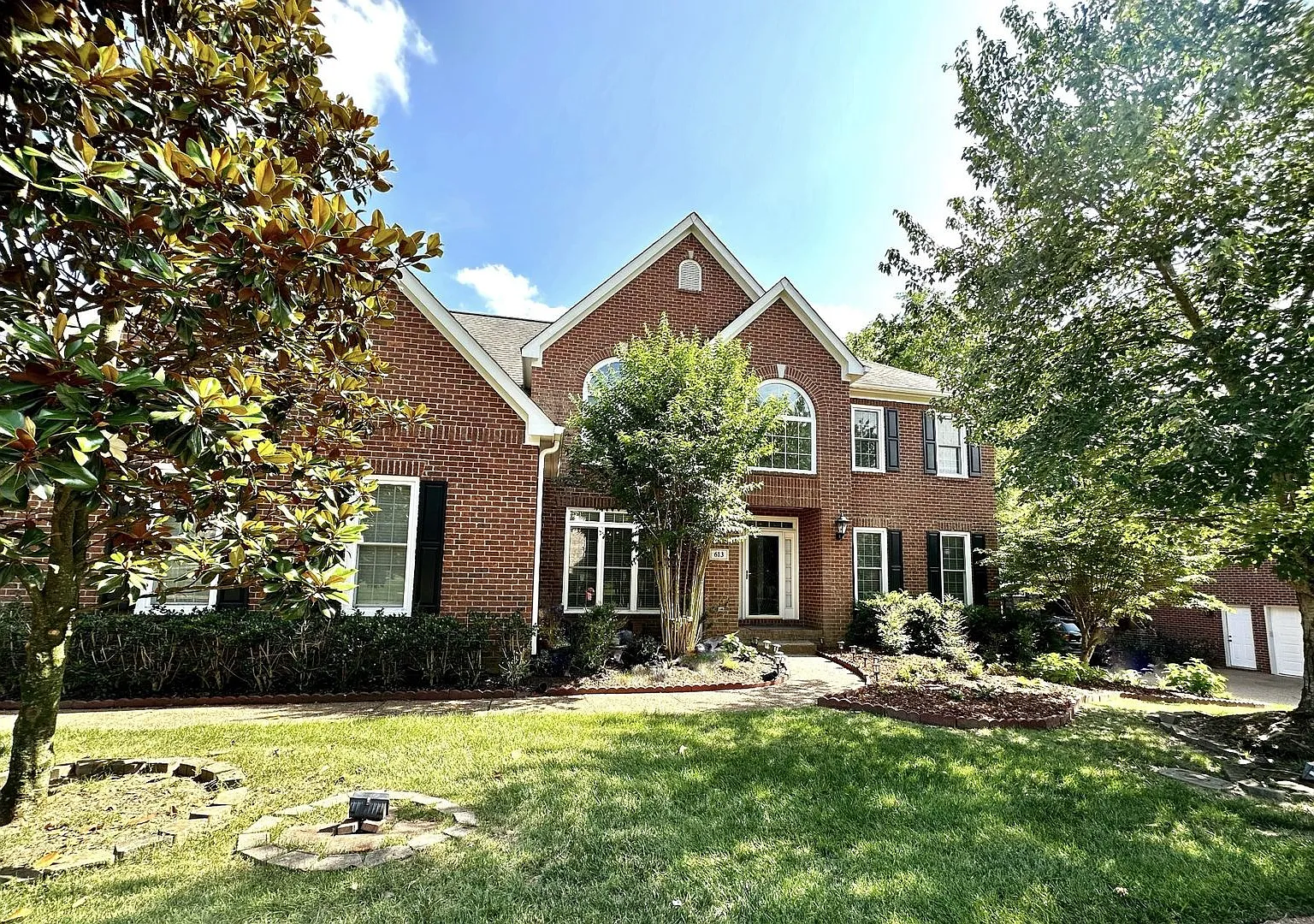 **Spacious & Elegant 4-Bedroom Brick Home** — Photo 1