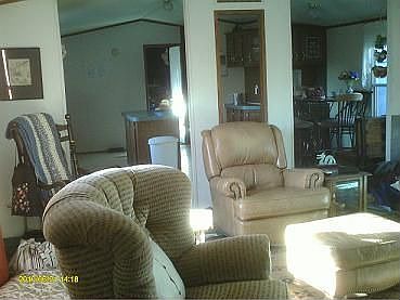 living area toward dining/kitchen area