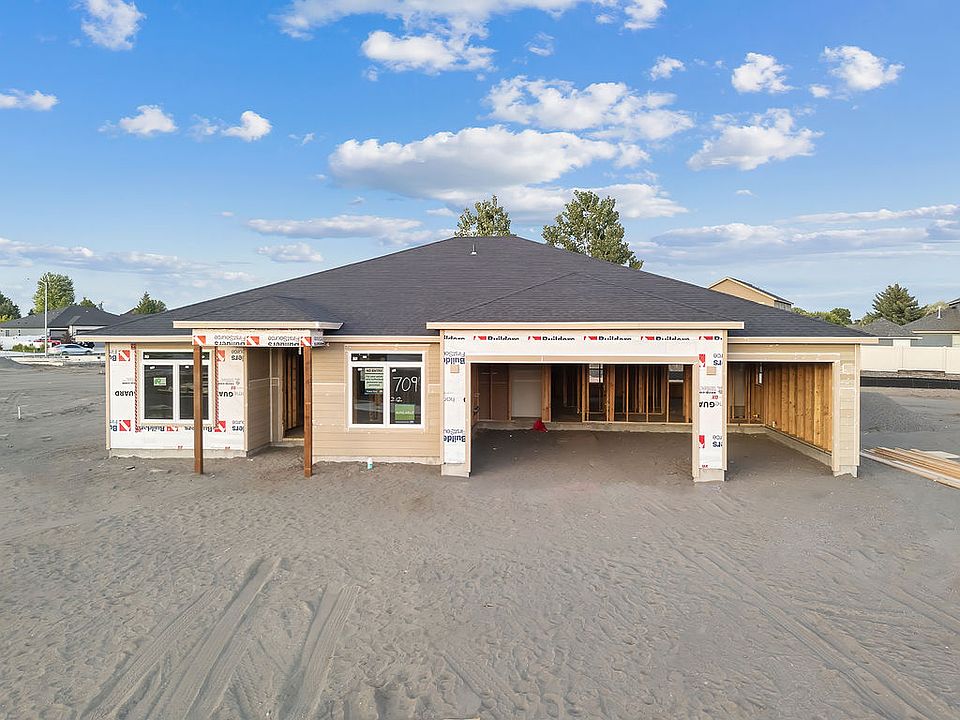 709 N Thrush CT by Aho Construction