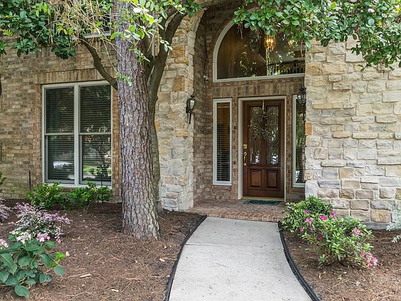 Inviting front entry with stacked stone elevation.