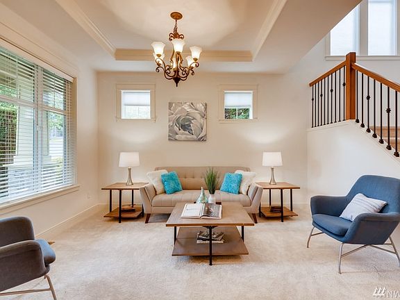 A living room on the left as you enter inside.