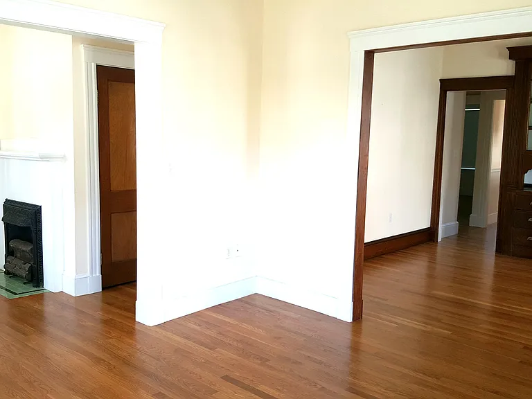Living Room to Front Entry and Dining Room