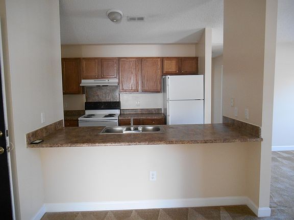 The kitchen also has a bar!