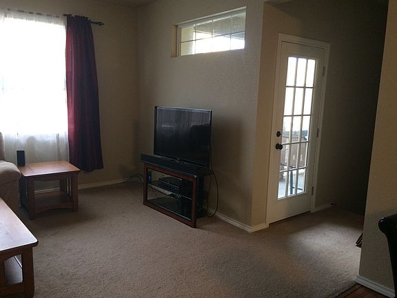 Living Room Area Showing Door to Patio
