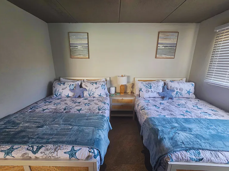 Two Queen beds with premium linens for the perfect night's sleep.