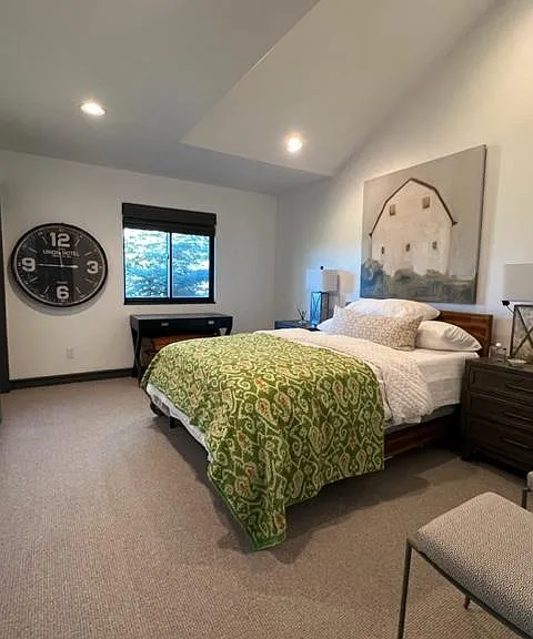 Main level guest with queen bed.