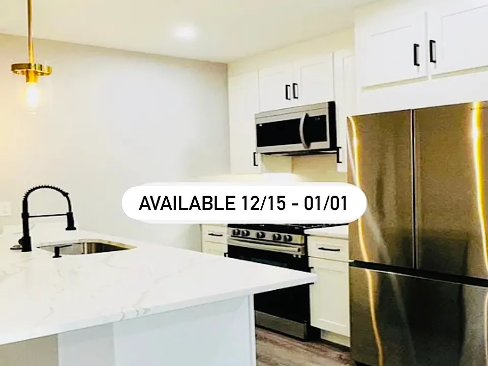 Stainless steel appliances, quartz countertops, and high end finishes