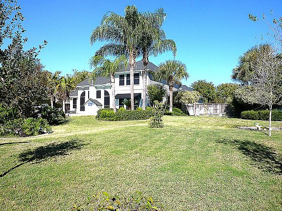 Lot Size 10,237 and 3230 Sq. Ft. per HCAD. Tropical Lush Landscaping with Sprinkler System.