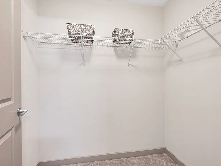 Oversized walk-in closets attached to master bedroom providing extra storage