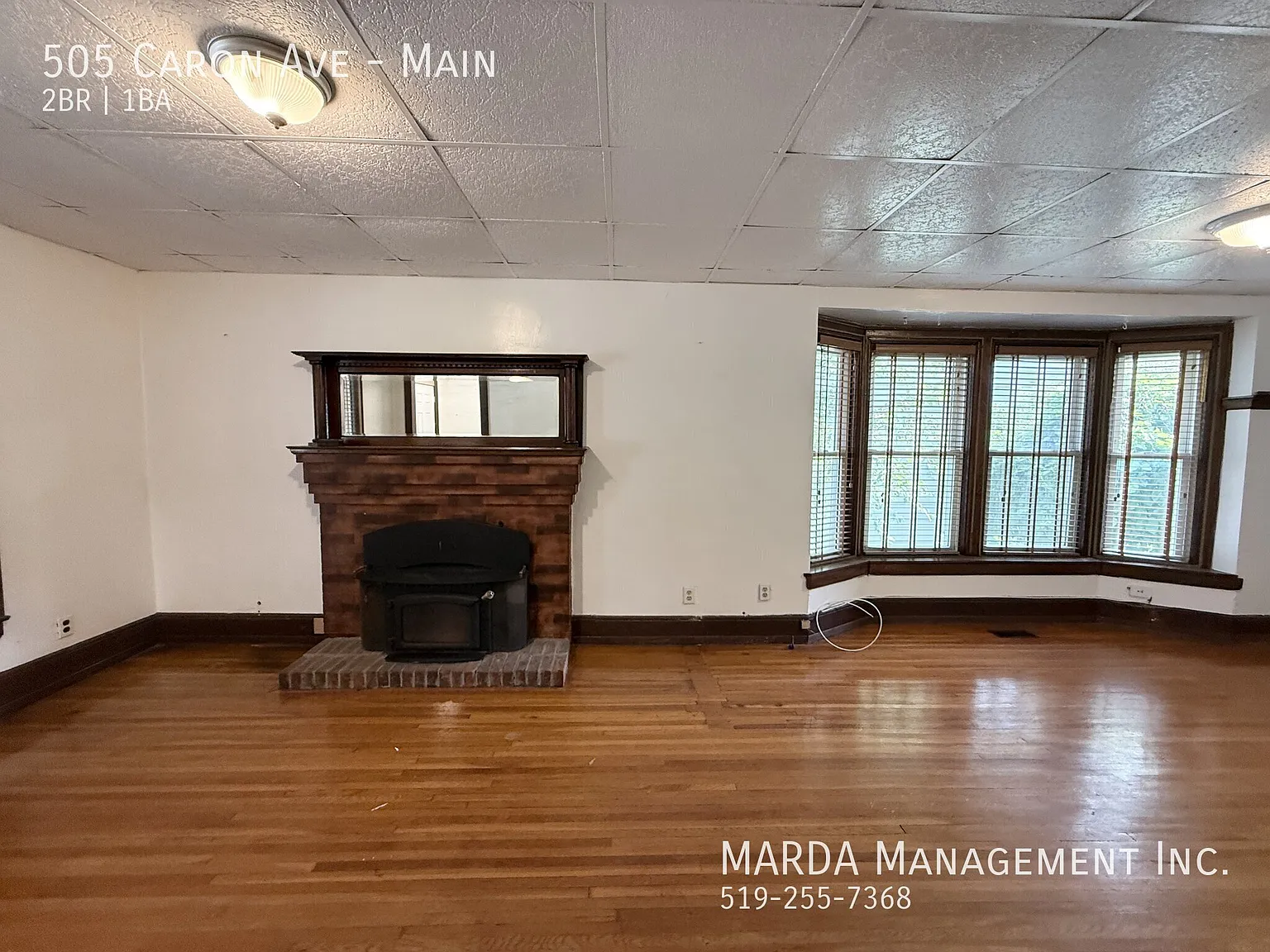 Charming 2 Bed/1 Bath Main Floor Unit W/ Driveway + 60% Of Utilities! — Photo 4