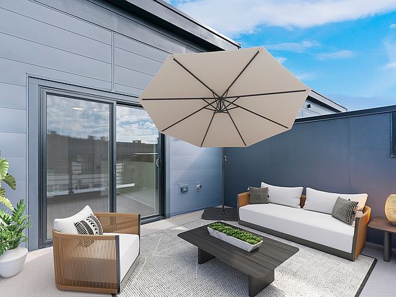 Roof deck with views of the city and the Washington Monument