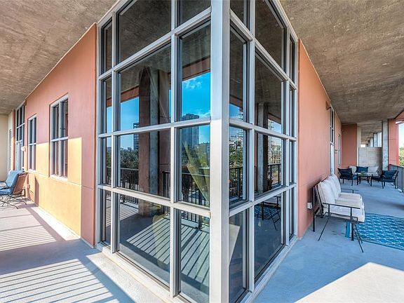 A rare treat in mid/rise living is a huge wrap around balcony! Enough space for several seating/dining areas, herb garden, flower garden, and even growing vegetables in pots if you wish. Corner windows is Secondary Bedroom. Left side of balcony acces