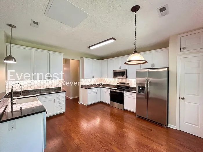 6228 Weathersfield Way — Photo 4