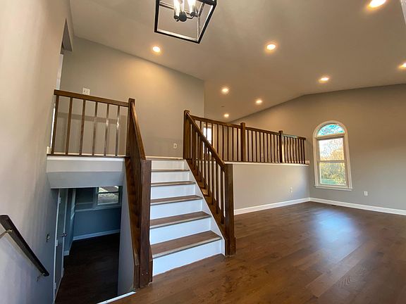 Split stairway to upstairs and basement