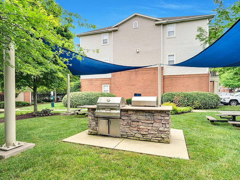 Grilling area with two gas grills and seating