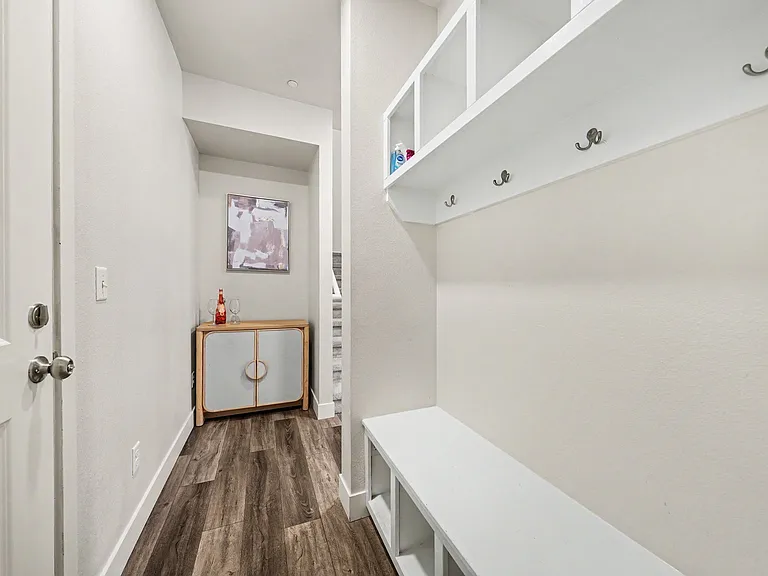 Custom built in shelves in mudroom area
