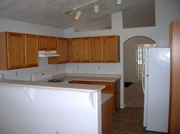 http://www.propertyboss.net/CustomerImages/AMMRE_1205/media/Properties/6105%20Star%20Gazer%20NW/zsmall_Kit.JPG