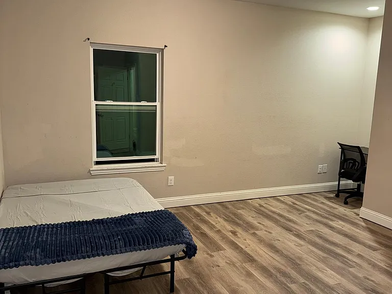 2nd Floor - This inviting bedroom offers convenience with a private door leading straight into the full-size bathroom.