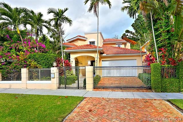 Live the Grove lifestyle in this lovely, gated home