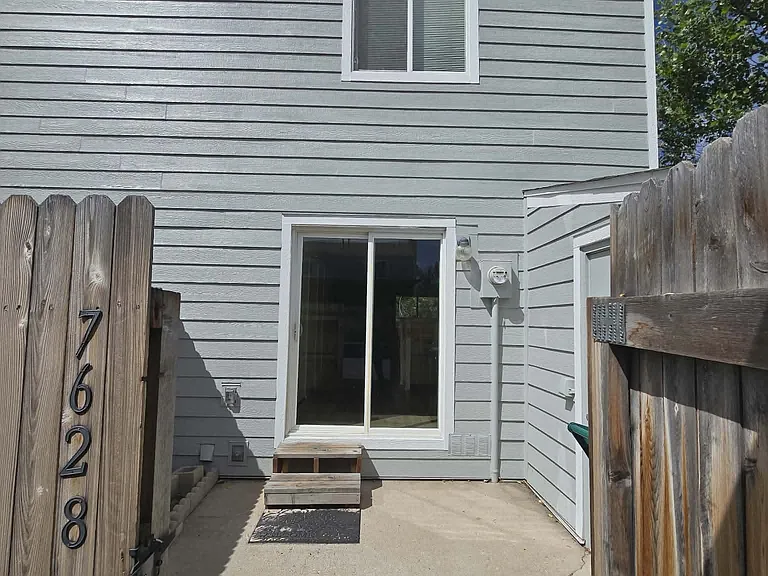 Gate from carport