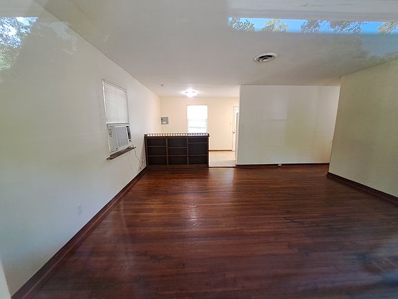 Living Room with Eat in Kitchen in the back