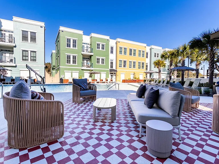 Poolside Patio Area at The Merchant Apartments in Charleston, SC 29403