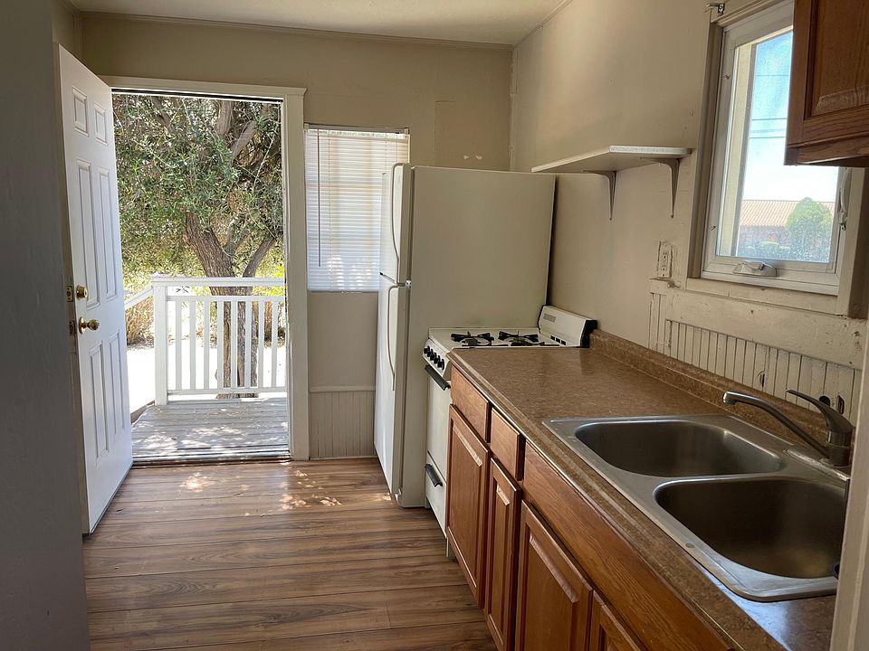 Front door and kitchen
