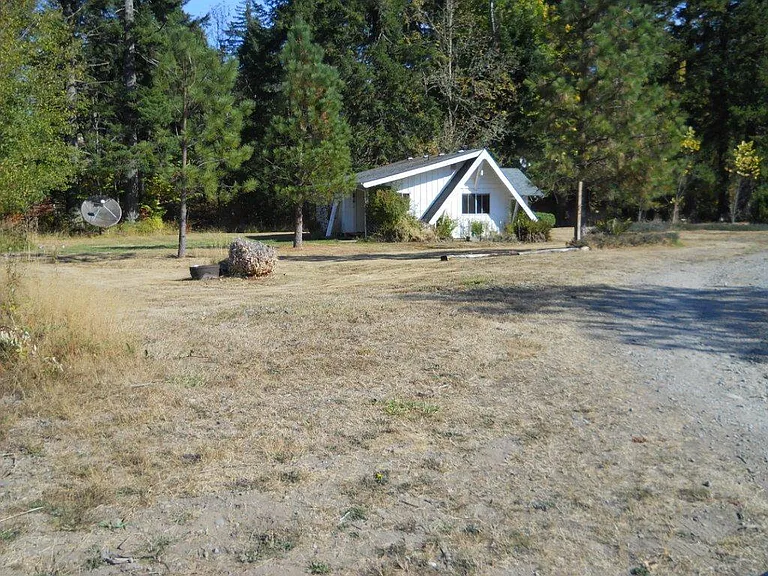 THIS IS WHAT YOU SEE ENTERING PROPERTY. YOURS TO MAINTAIN. NOTHING PAST THIS PHOTO EXCEPT YOUR CARPORT. ALL NEEDS MOWING TWICE A MONTH; APRX. SPRING & FALL. (got riding mower?) ONLY RUNNING & REGISTERED VEHICLES , NO MOTOR CYCLES. THANK YOU~