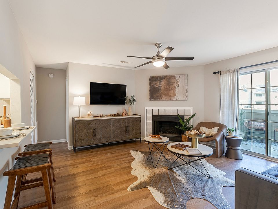 Newly Renovated Living Room with Hardwood-Style Flooring