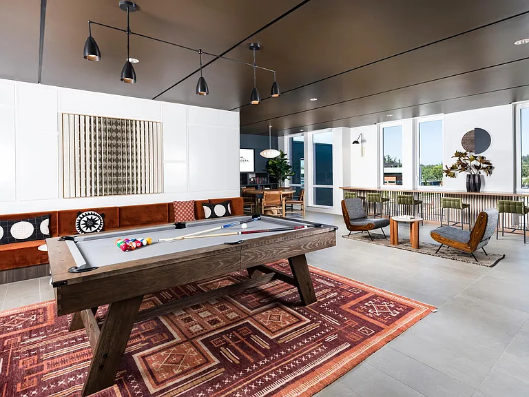 Level up your downtime in our game room_complete with billiards, shuffleboard, and a poker table.