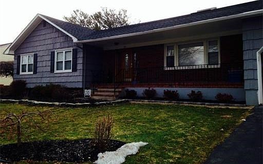Front of the House... Waiting for the trees and bushes to bloom