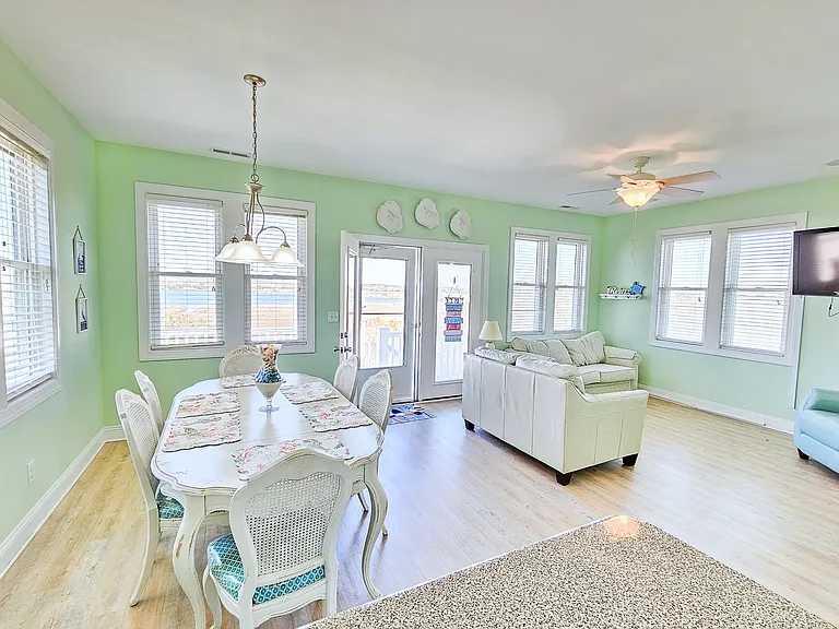 dining and living room. Sound views out the windows, and has an upper deck. Gorgeous sunsets over the sound!