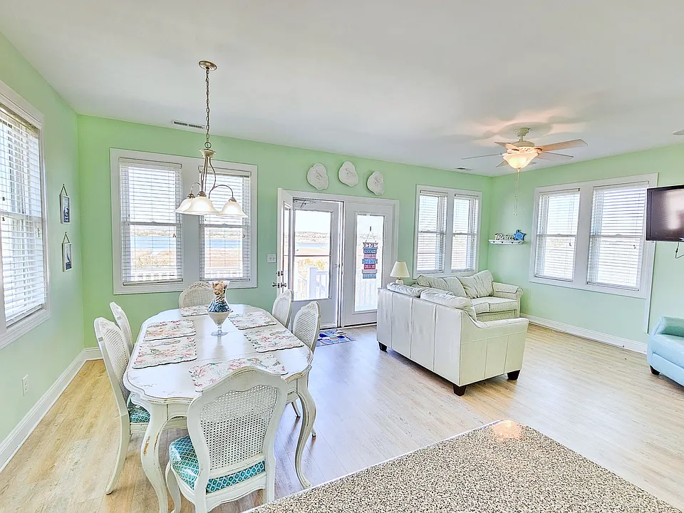 dining and living room. Sound views out the windows, and has an upper deck. Gorgeous sunsets over the sound!