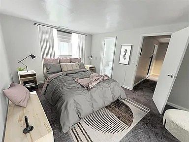 Bedroom w/Ample closet space & attached bathroom.