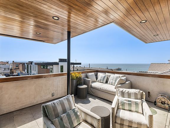 Enjoy the view from this incredible balcony that opens directly to the living room, dining room and kitchen.