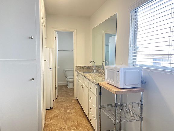 Limestone Tile Floors / Granite Counters