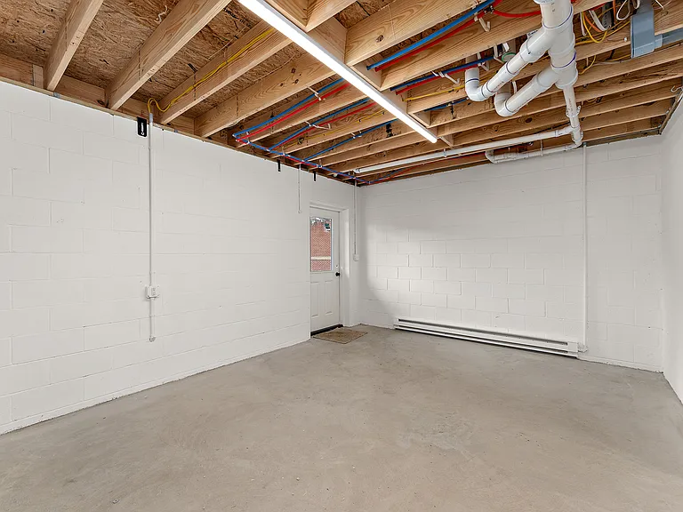 Full Heated Basement with Backdoor access to Back Yard