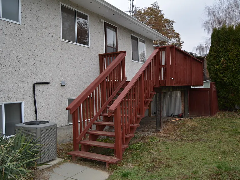 Back deck off kitchen to fenced yard